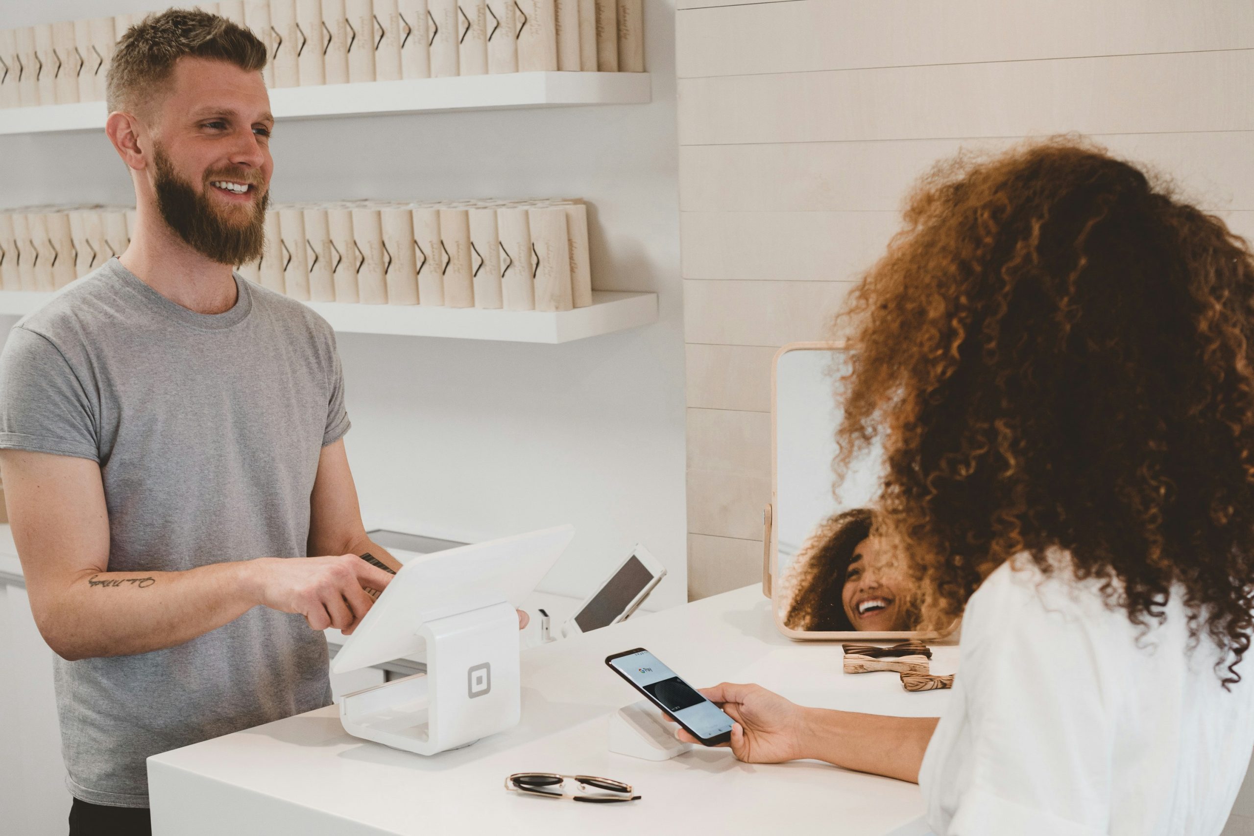 man and women taking part in a purchase transaction